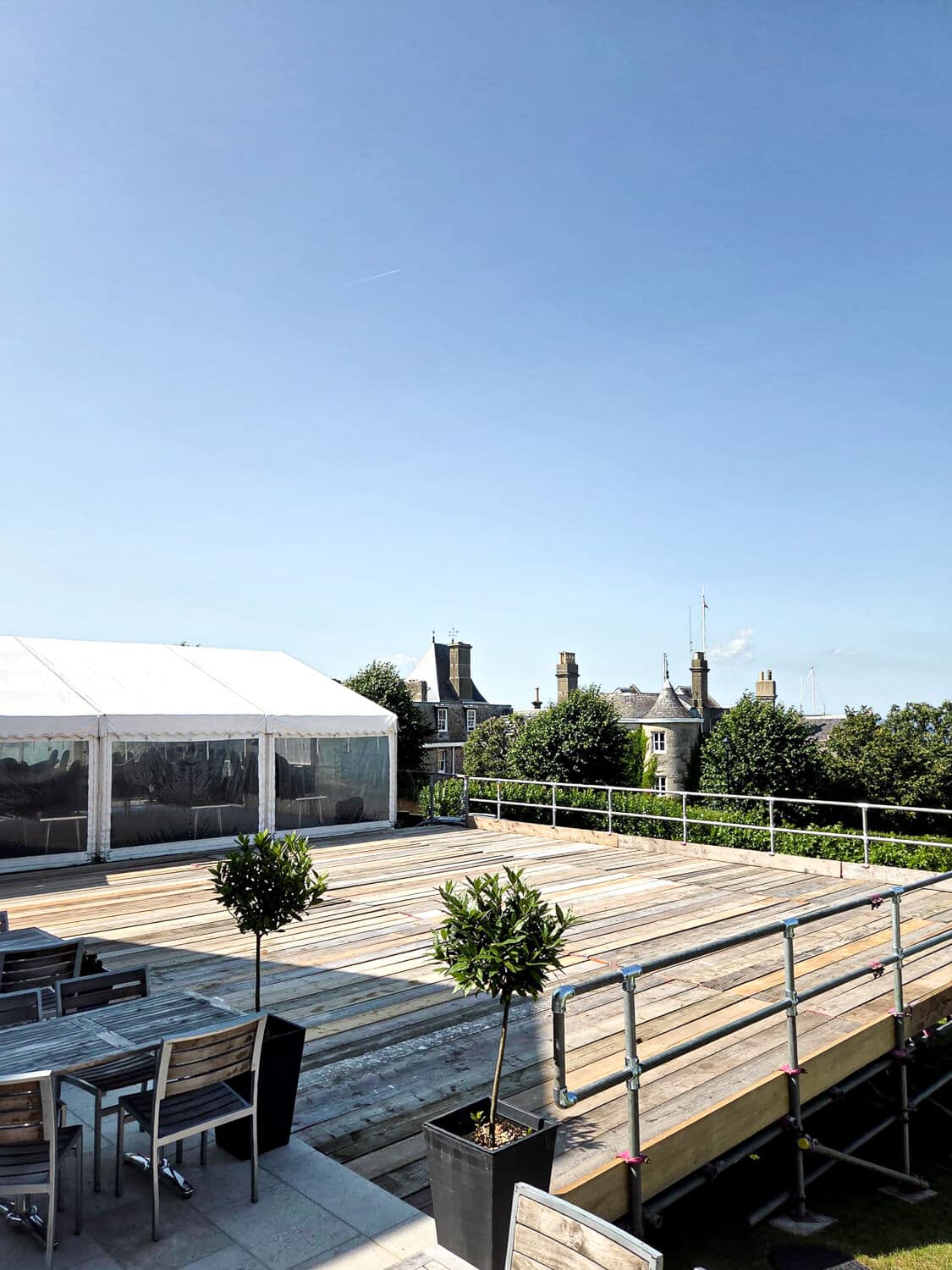 Bespoke scaffold platform with timber decking and event marquee on the Isle of Wight