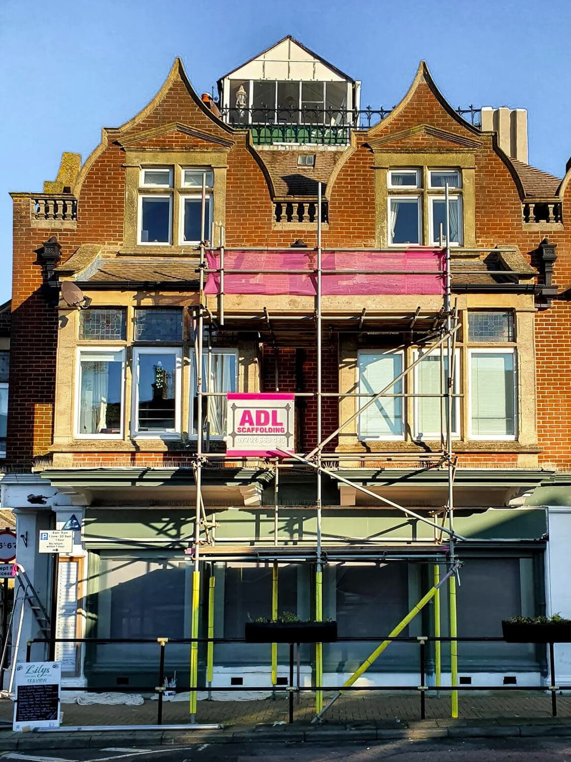 Scaffolding on a Victorian mixed-use commercial and residential building, Isle of Wight